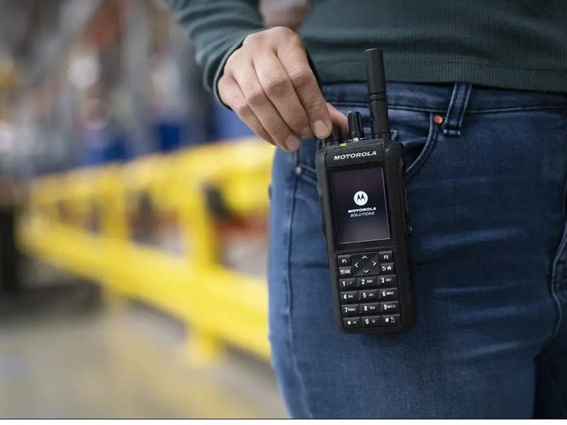 Motorola digital handheld radio carried on a belt clip